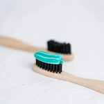 Person brushing teeth